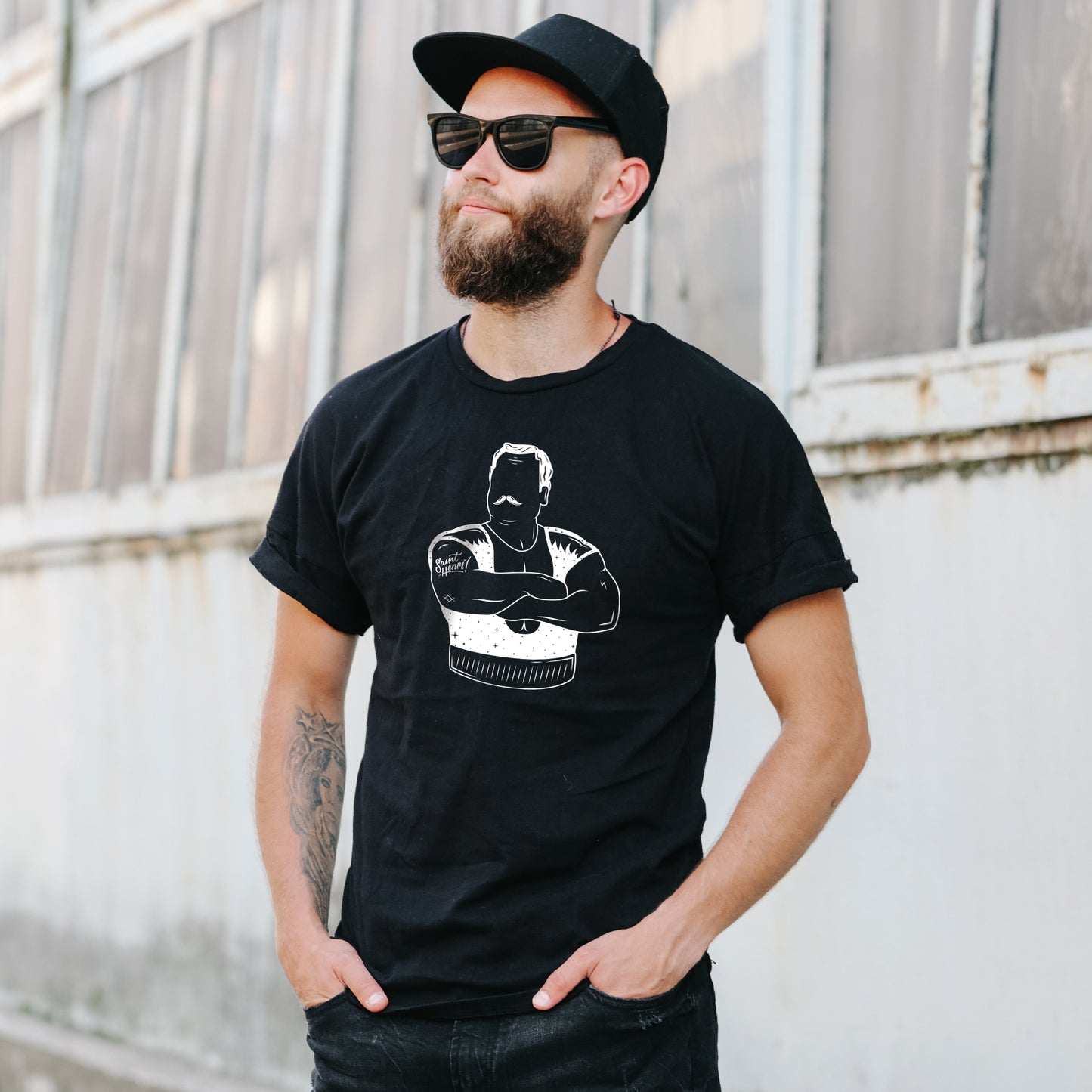 man wearing a black louis cyr t-shirt with a white design, strongest man, saint-henri