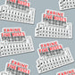 Stickers with 'Farine Five Roses' text and building design on a gray background