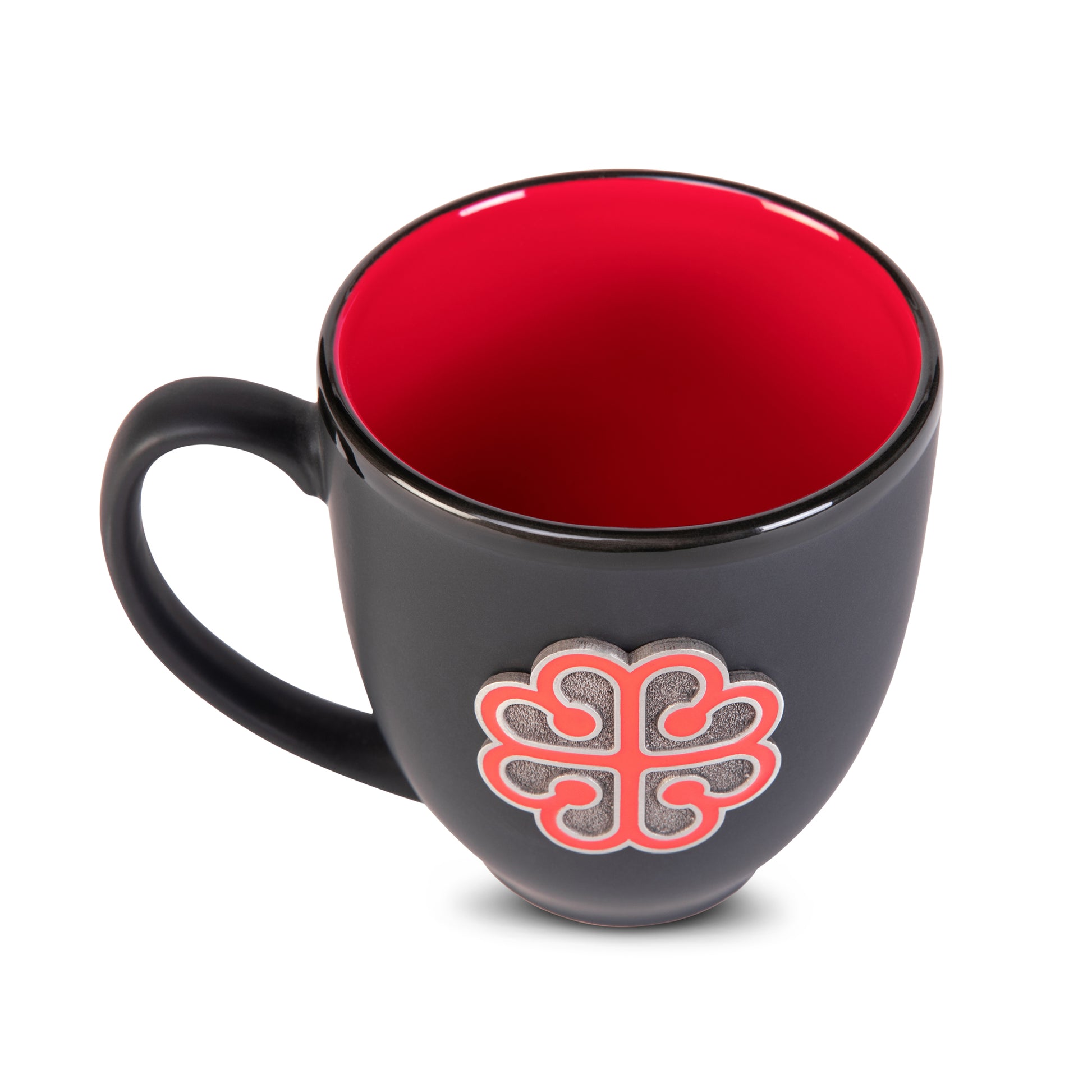 Black mug with red interior and decorative red emblem on a white background