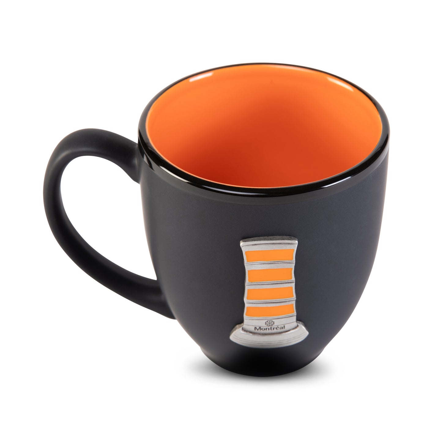 Black mug with orange interior and decorative element on a white background