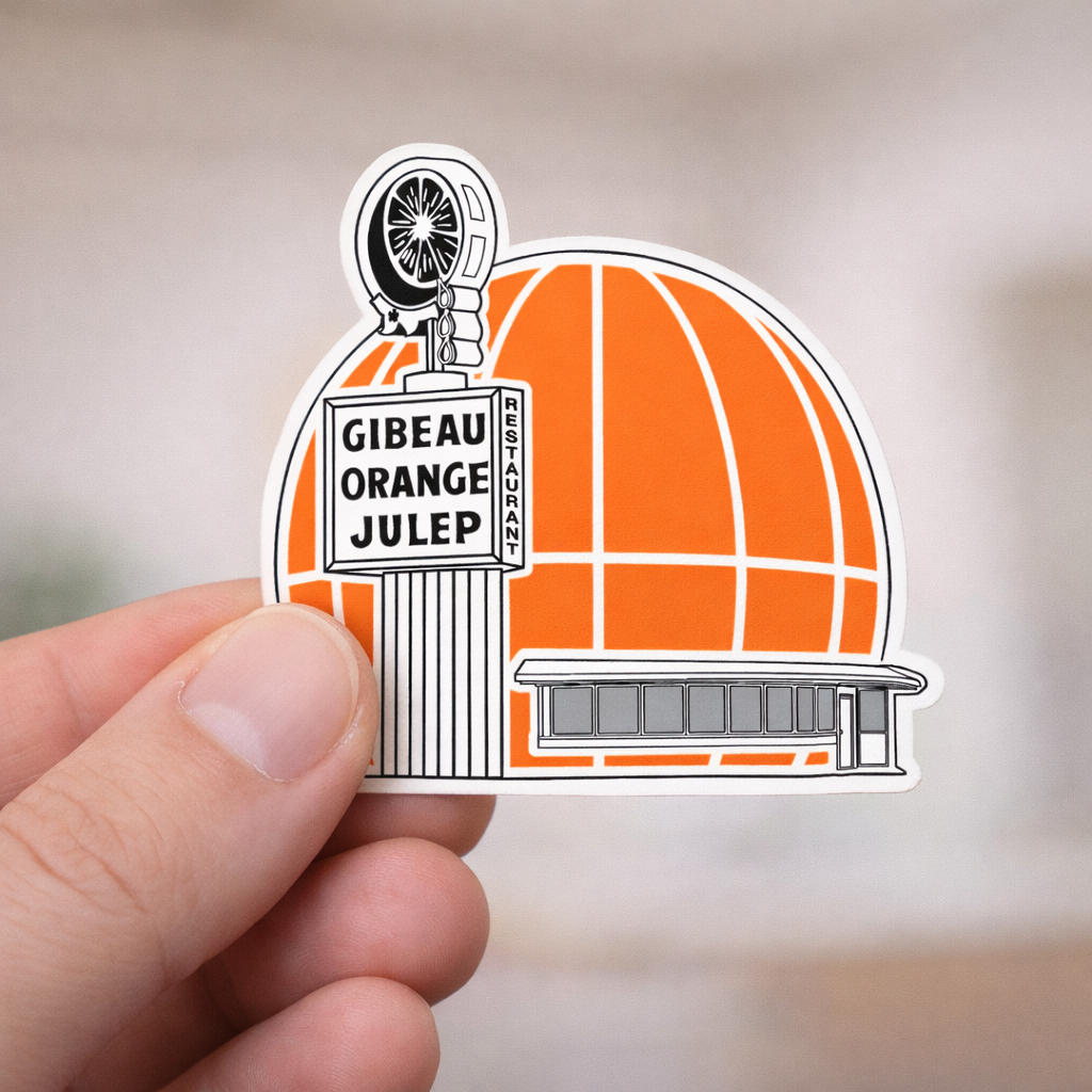 Sticker of Gibeau Orange Julep with a hand holding it against a blurred background