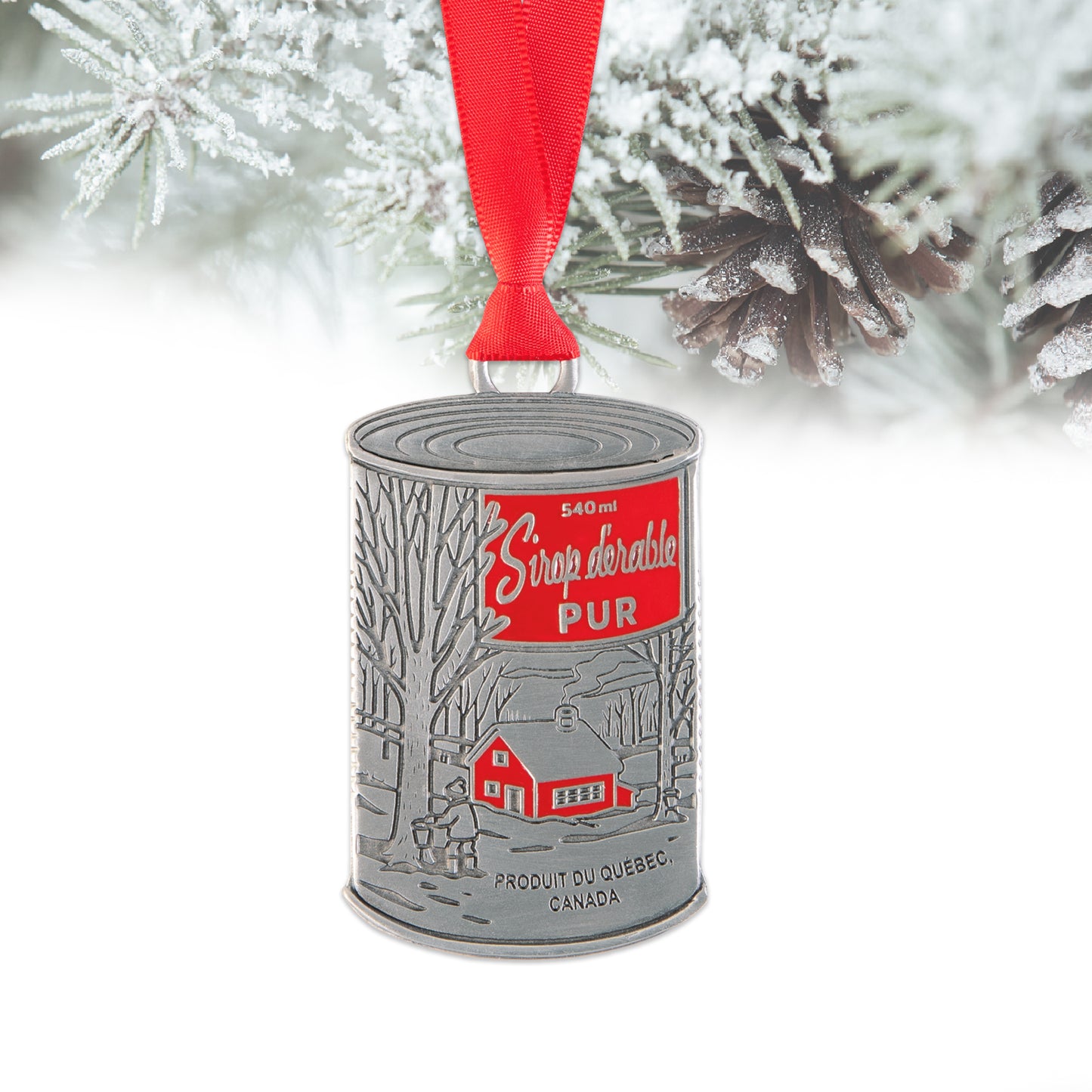 maple syrop can ornament on a tree white background