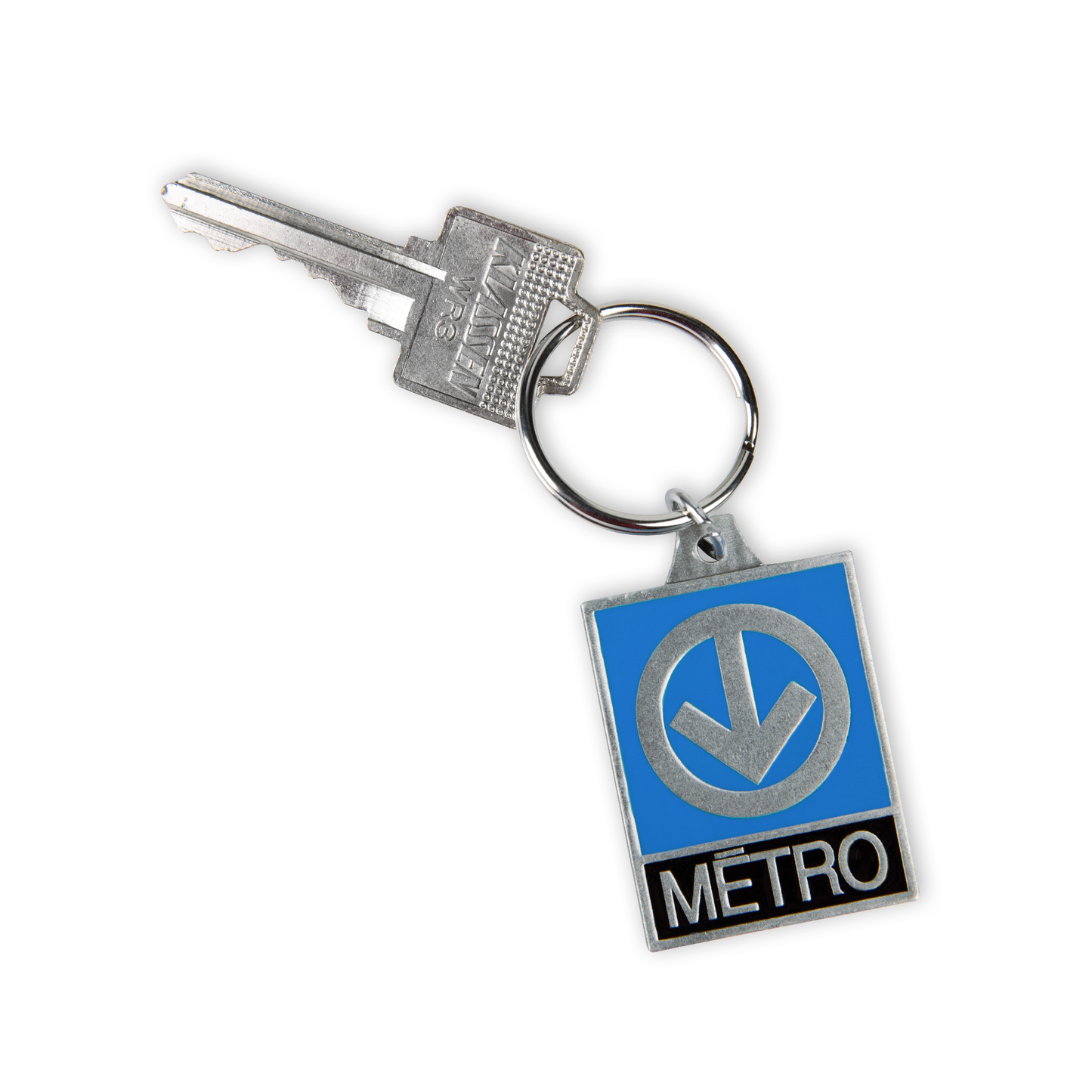 A keychain with key. The keychain is the iconic Montreal Metro sign: an arrow pointed down in a circle against a blue background. Below it says "metro"